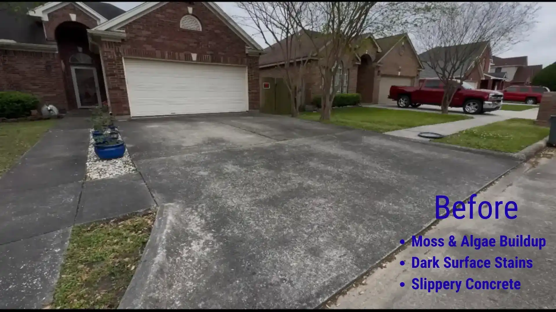 Before driveway cleaning showing moss, algae, dark surface stains, and organic buildup on a concrete driveway in front of a brick residential home in Eugene, Oregon.