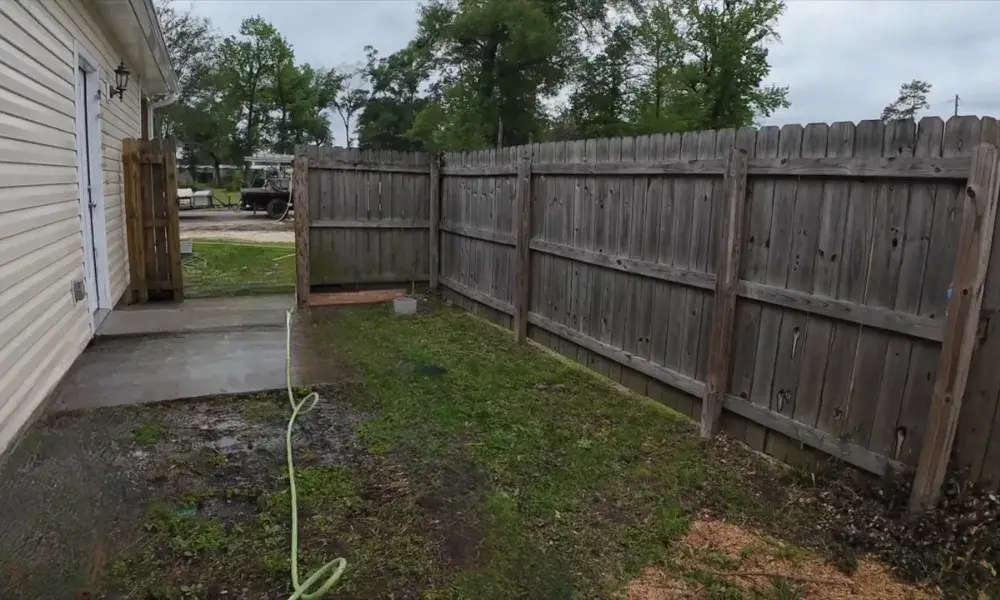 Weathered wooden fence before professional fence cleaning in Eugene, Oregon